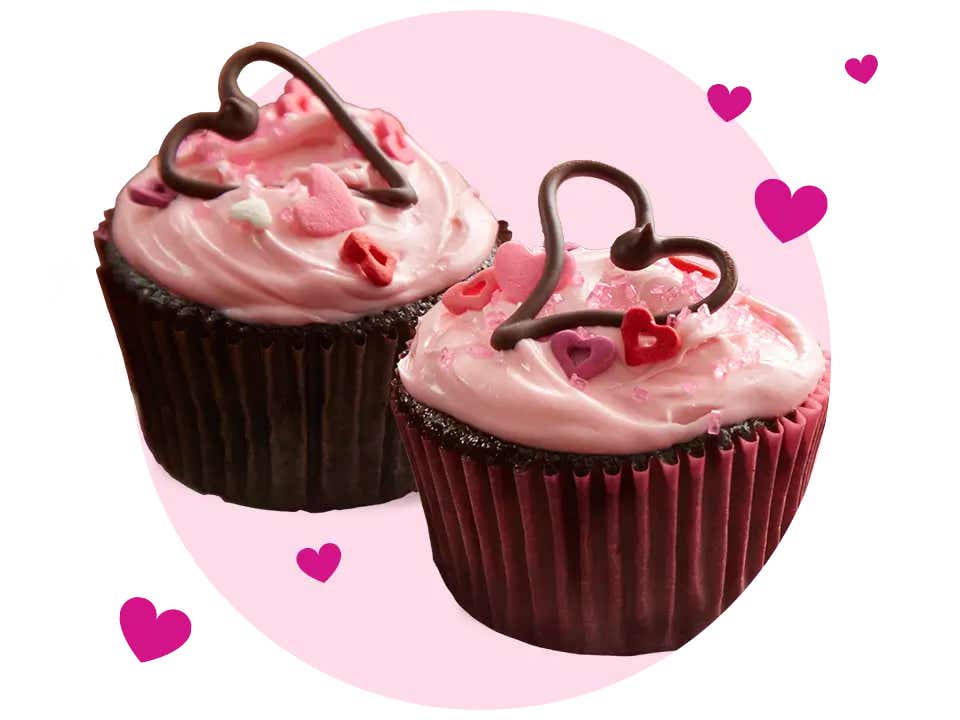 pair of valentines day themed cupcakes